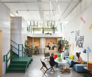 Alma-nac architects convert industrial building into quirky workspace with photo studio