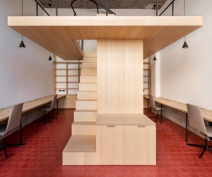 A single wooden insertion defines this micro co-working space in Bilbao