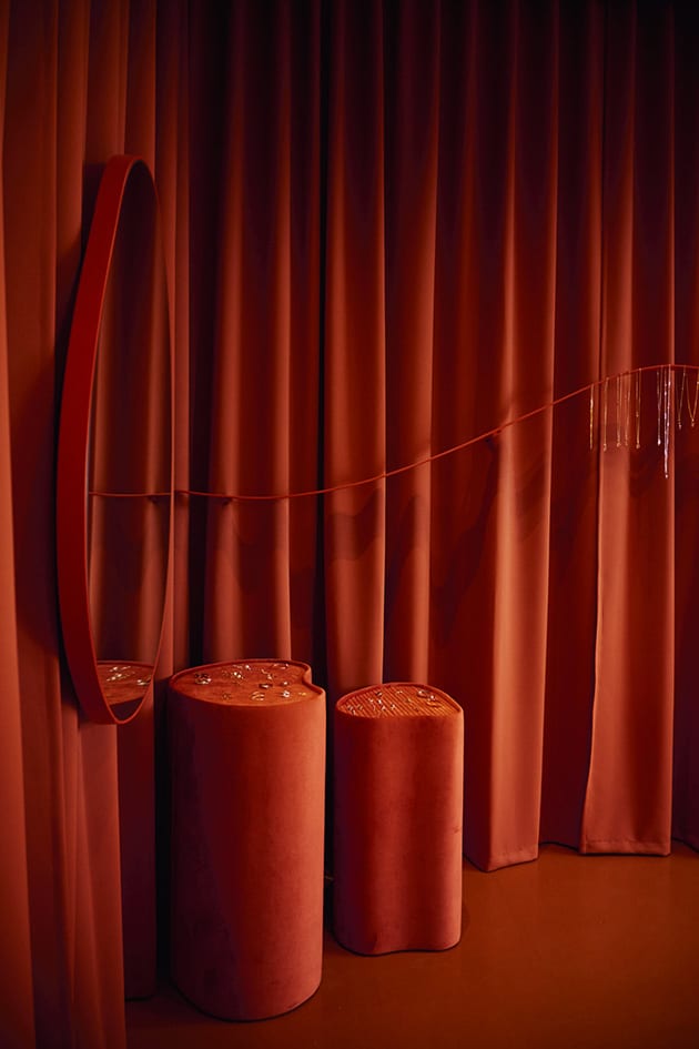 terracotta curtains and display stands in jewellery shop - onofficemagazine.com