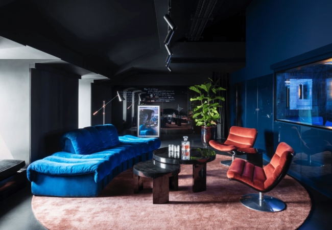Tala Fustok Studio and TP Bennett use polished concrete and sharp neon lighting to create edgy office interior