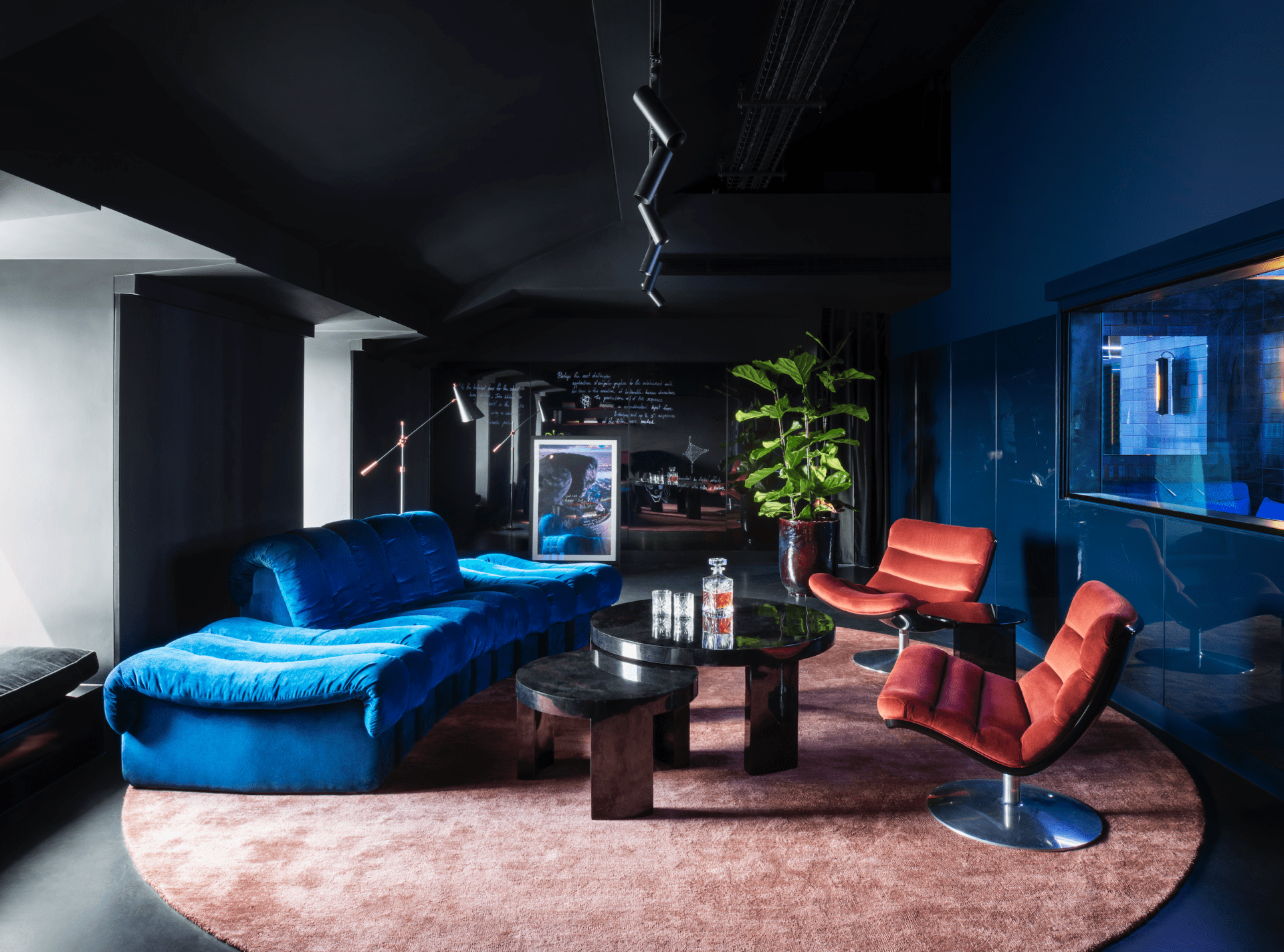 Tala Fustok Studio and TP Bennett use polished concrete and sharp neon lighting to create edgy office interior