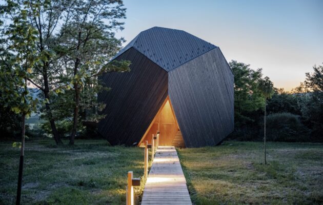 Hello Wood creates a collection of boulder-like cabins in the Hungarian countryside