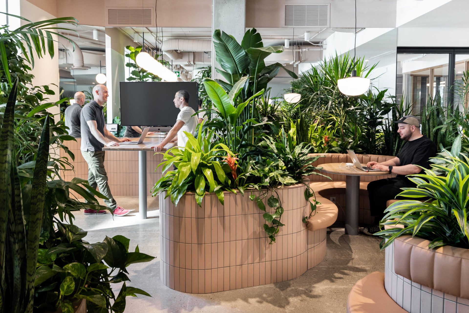 Danish minimalism with a brutalist edge creates a tranquil workplace at the Zendesk Montreal office by MRDK and Studio MHA