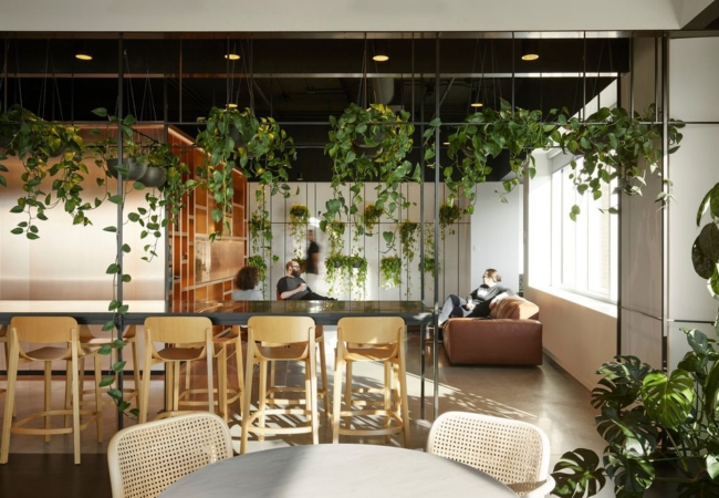 ACDF Architects design hotel inspired workplace for tech company 2K Games