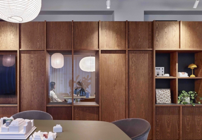 The dMFK office transforms a former showroom into a thriving architecture studio
